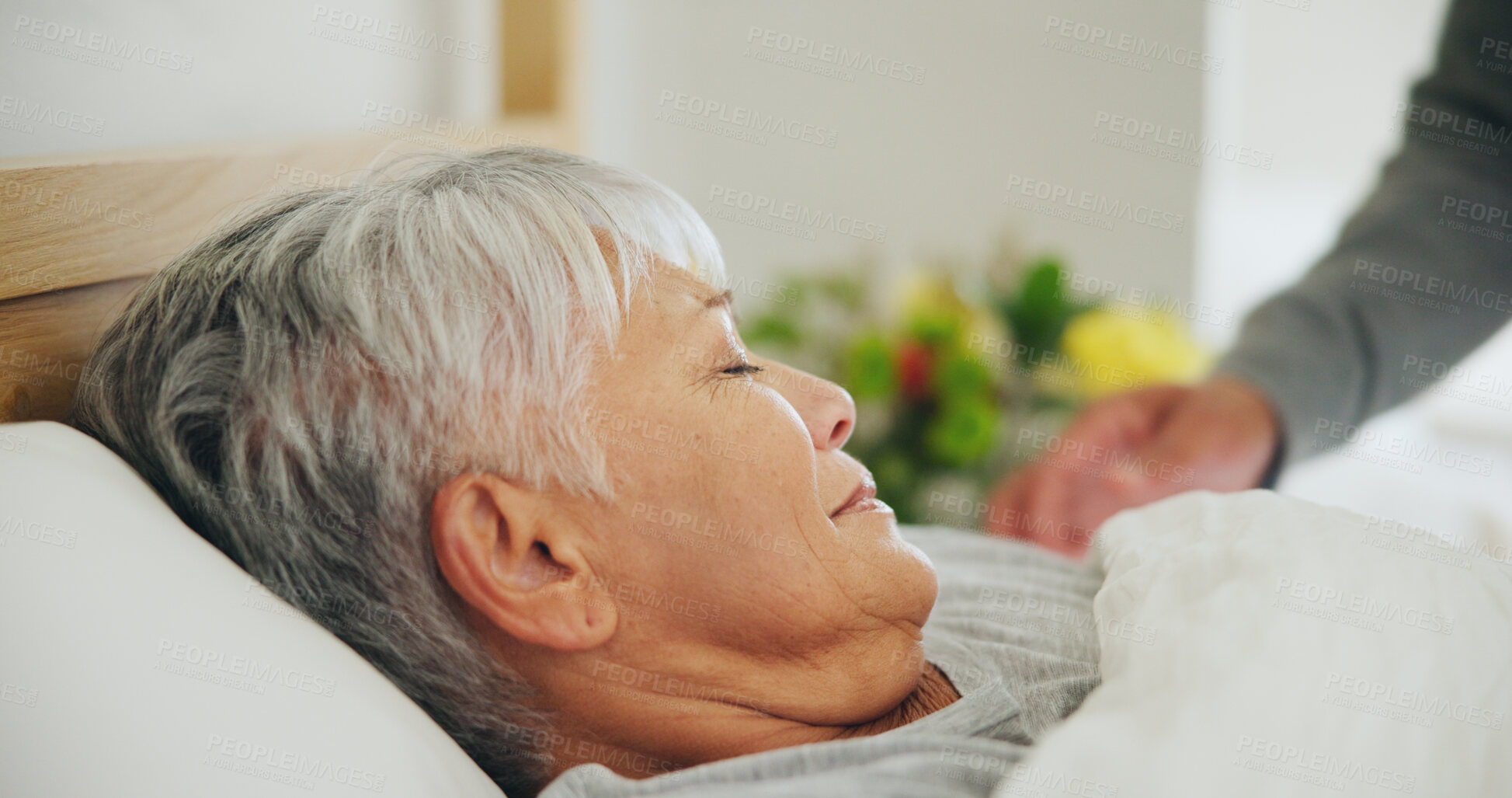 Buy stock photo Sleep, tired and a senior woman in bed for peaceful rest or to relax in her retirement home closeup. Face, morning and eyes closed with an exhausted old person dreaming in the bedroom of an apartment