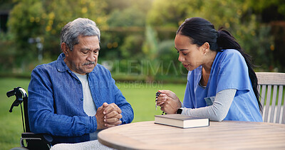 Buy stock photo Wheelchair, praying or nurse with senior man for care, support or trust in retirement or nature. Caregiver, help and person or elderly patient with a disability or medical professional for worship