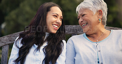 Buy stock photo Happy, mature and mother with woman on bench, nature and bonding for laugh on retirement. Senior person, parent and older daughter for leisure together in park, care and love for funny joke in garden