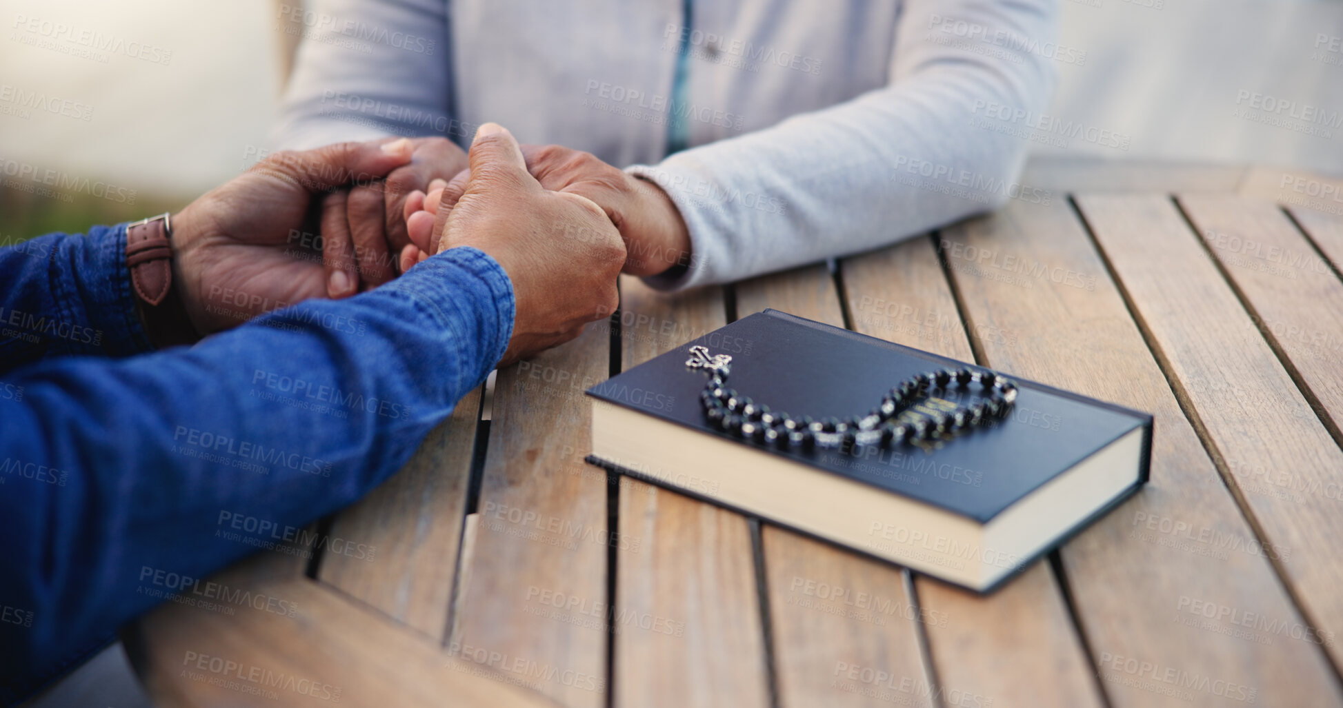 Buy stock photo Bible, praying or couple holding hands on table together in a Christian belief with hope or faith. Jesus, zoom or senior man with woman in prayer to god for spiritual support or worship in religion