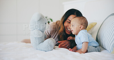 Buy stock photo Happy, mom and baby with teddy bear in bedroom or home with love, care and support in morning. Newborn, child and mother smile together and bonding with toys, fun or kid laughing on bed in house