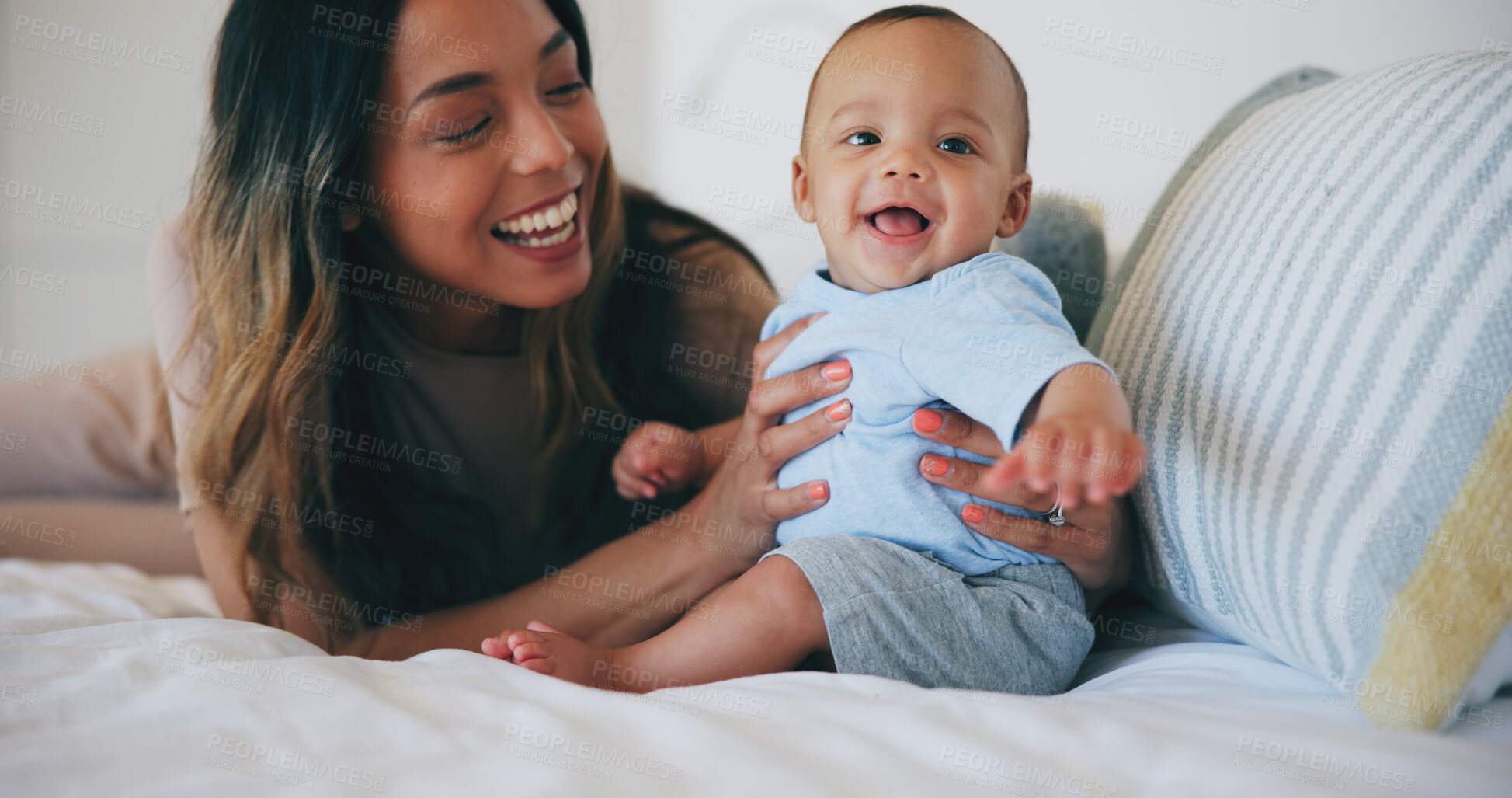 Buy stock photo Family, smile and a mother on the bed with her baby in their home together for care or bonding. Children, love and a happy young woman in the bedroom of an apartment with her adorable infant son