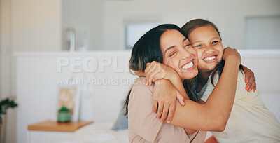Buy stock photo Face, smile and a mother hugging her daughter in the bedroom of their home in the morning together. Family, love and a happy young girl embracing her single parent while on a bed in their apartment