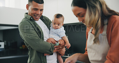 Buy stock photo Family, smile and cooking in closeup, love and bonding in kitchen, relax and support or laughing at home. Happy parents and baby, connect and hug or embrace, fun and humor or joyful conversation