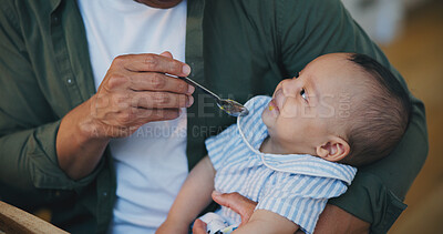 Buy stock photo Man, feed and baby or food closeup with spoon as nutrition meal, health or cooking. Male person, hand and childhood development or parent love connect for dinner diet or growth, happy kid or vitamin