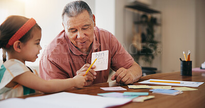 Buy stock photo Happy grandpa, little girl and learning to read and write for literature, education or bonding together at home. Grandparent with child or kid at homeschool for knowledge, study or lesson at house