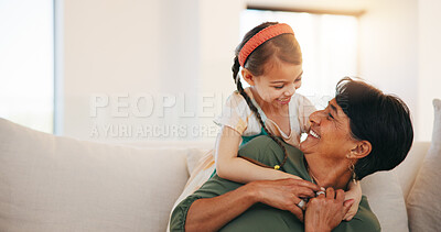 Buy stock photo Home, relax and hug with grandmother, girl and happiness with weekend break, embrace and bonding together. Old woman, senior person and child with joy, conversation or support with love, care and kid