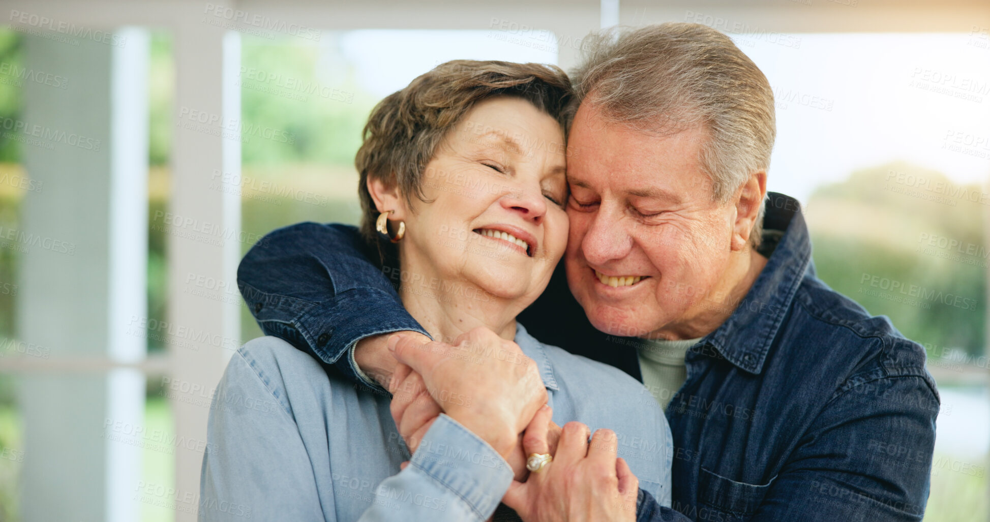 Buy stock photo Senior couple, hug and smile at home for love, loyalty and retirement bliss in marriage commitment. Mature man, woman or embrace for gratitude in together, peace wellness and kindness in family house