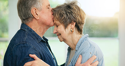 Buy stock photo Senior couple, forehead or kiss of love in support, loyalty or commitment in retirement in family home. Mature man, woman or marriage in gratitude for together in trust, security or care in apartment