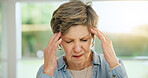 Stress, headache or old woman in home with burnout, worry or fatigue in retirement frustrated by debt. Exhausted person, anxiety or tired elderly lady with problem, crisis or head pain with migraine