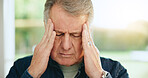 Stress, headache or old man in home with burnout, worry or fatigue in retirement frustrated by debt. Depression anxiety, face or tired elderly person with problem, crisis or head pain with migraine