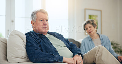 Buy stock photo Senior, couple or stress with conflict and fight on sofa in living room of home with anger and silence. Elderly, man or woman with argument, upset and frustrated on couch in lounge of house or ignore