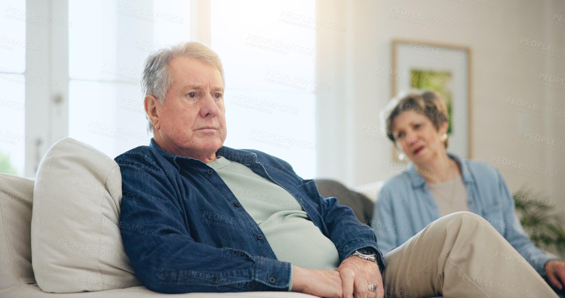 Buy stock photo Senior, couple or stress with conflict and fight on sofa in living room of home with anger and silence. Elderly, man or woman with argument, upset and frustrated on couch in lounge of house or ignore