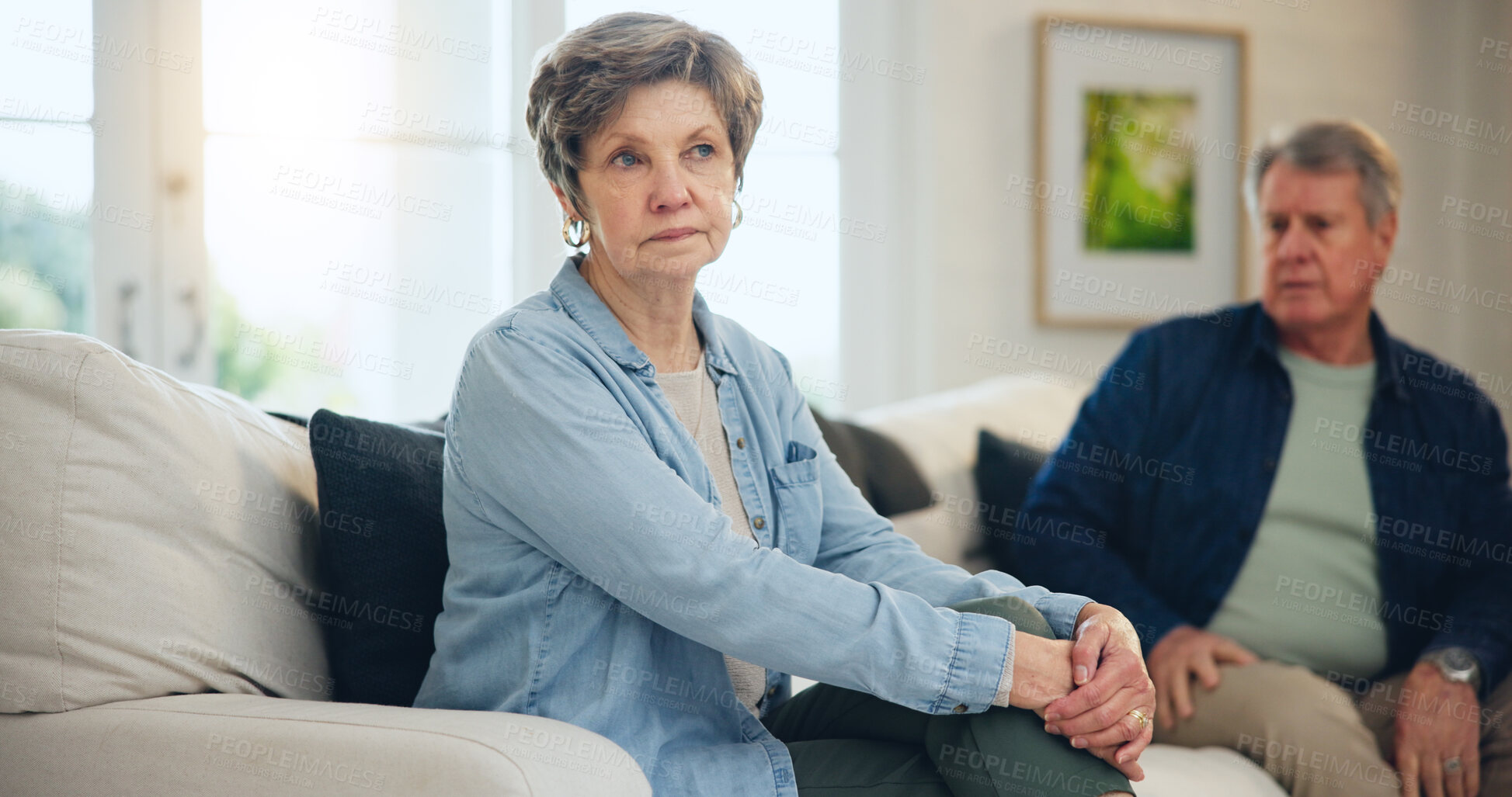 Buy stock photo Senior, couple or angry with conflict and fight on sofa in living room of home with anger and silence. Elderly, man or woman with argument, upset and frustrated on couch in lounge of house or ignore