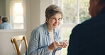Happy, coffee or old couple talking in kitchen at home bonding or enjoying conversation together. Smile, break or senior man in a house speaking or drinking tea with an elderly woman in retirement
