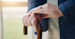 Hands, walking stick or elderly person with disability, retirement closeup or cancer in home. Senior care, cane or help with balance, support or Parkinson disease with arthritis with health issue