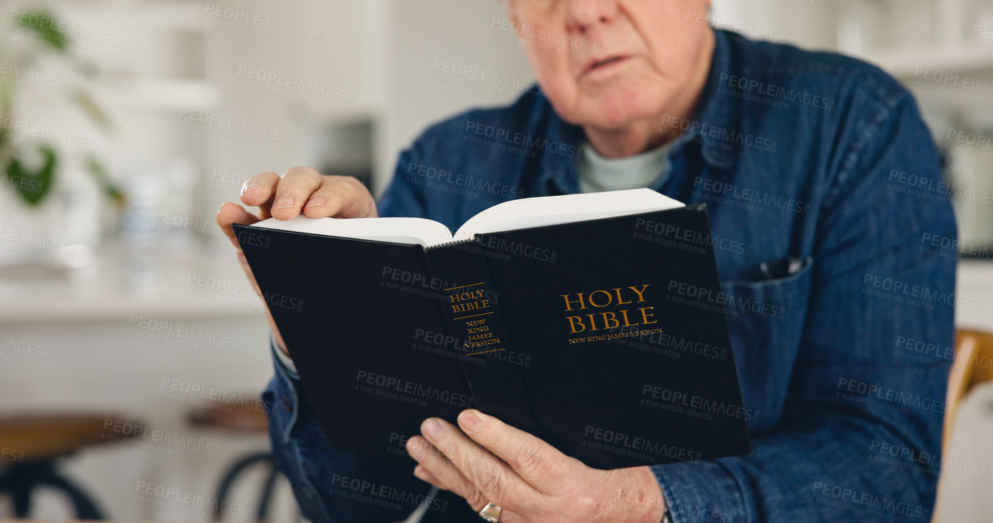 Buy stock photo Reading, Bible and hands of old man in home with Christian worship, prayer or education in faith. Elderly, person or studying holy gospel, religion or trust in God or spiritual learning in retirement