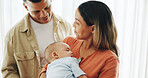 Family, love and parents with baby in home for bonding, healthy relationship and childcare. Happy, childhood and mother, father and newborn infant embrace, care and relax together for happiness