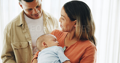 Buy stock photo Family, love and parents with baby in home for bonding, healthy relationship and childcare. Happy, childhood and mother, father and newborn infant embrace, care and relax together for happiness