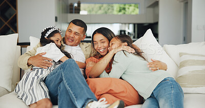 Buy stock photo Love, hug and happy family on a sofa with support, care and security in their home together. Smile, embrace and girl children with parents in a living room for bond, playing and having fun in a house