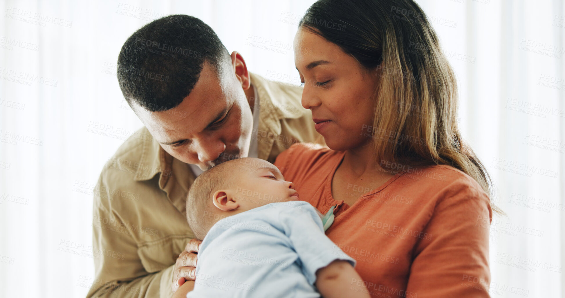 Buy stock photo Family, love and parents kiss baby for bonding, healthy relationship and childcare in home. Happy, childhood and mother, father and newborn infant embrace, care and relax together for happiness