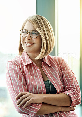 Buy stock photo Cropped shot of a businesswoman looking out the window from an office
