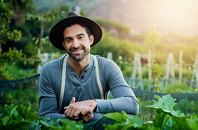 Buy stock photo Portrait of a young man tending to the crops on a farm