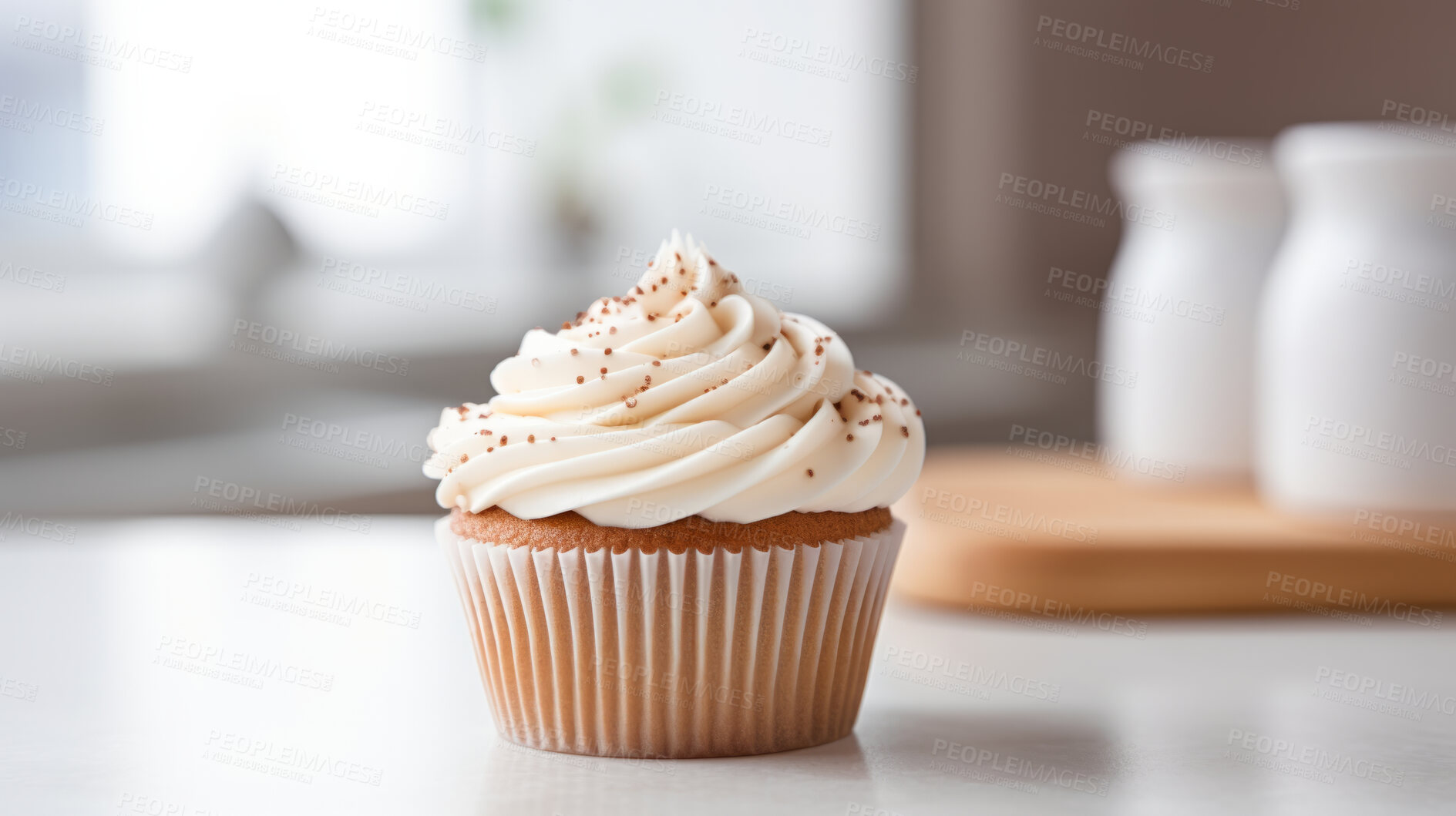 Buy stock photo Cupcake, birthday and valentine anniversary pastry with vanilla flavoured topping for celebration, party or event. Sweet, delicious and tasty frosting for food photography on a kitchen table