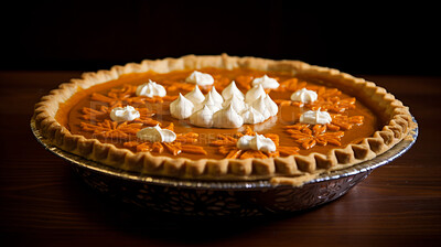 Traditional, pumpkin pie and thanksgiving treat or dessert for festive holiday celebration or dinner, topped with whipped cream. Delicious, rustic and tasty closeup of a home-made pastry on a plate