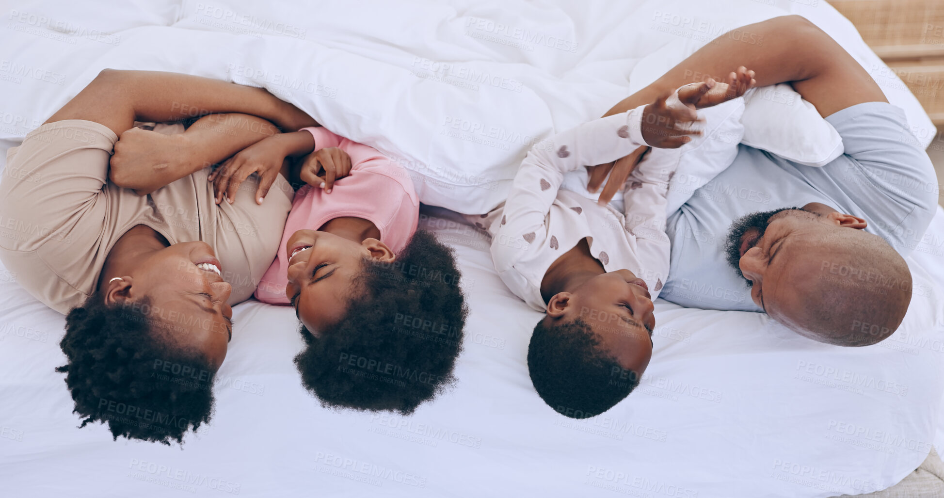 Buy stock photo Bedroom, relax and black family parents, happy kids or people bonding, love and care young youth. Home wellness, happiness and African children, father and mother support, comfort and smile on bed