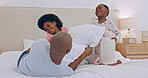 Bedroom, pillow fight and black family father, happy kids or people bonding, fun and papa playing with young youth. Home, games and African children, dad and girl energy, morning and excited on bed