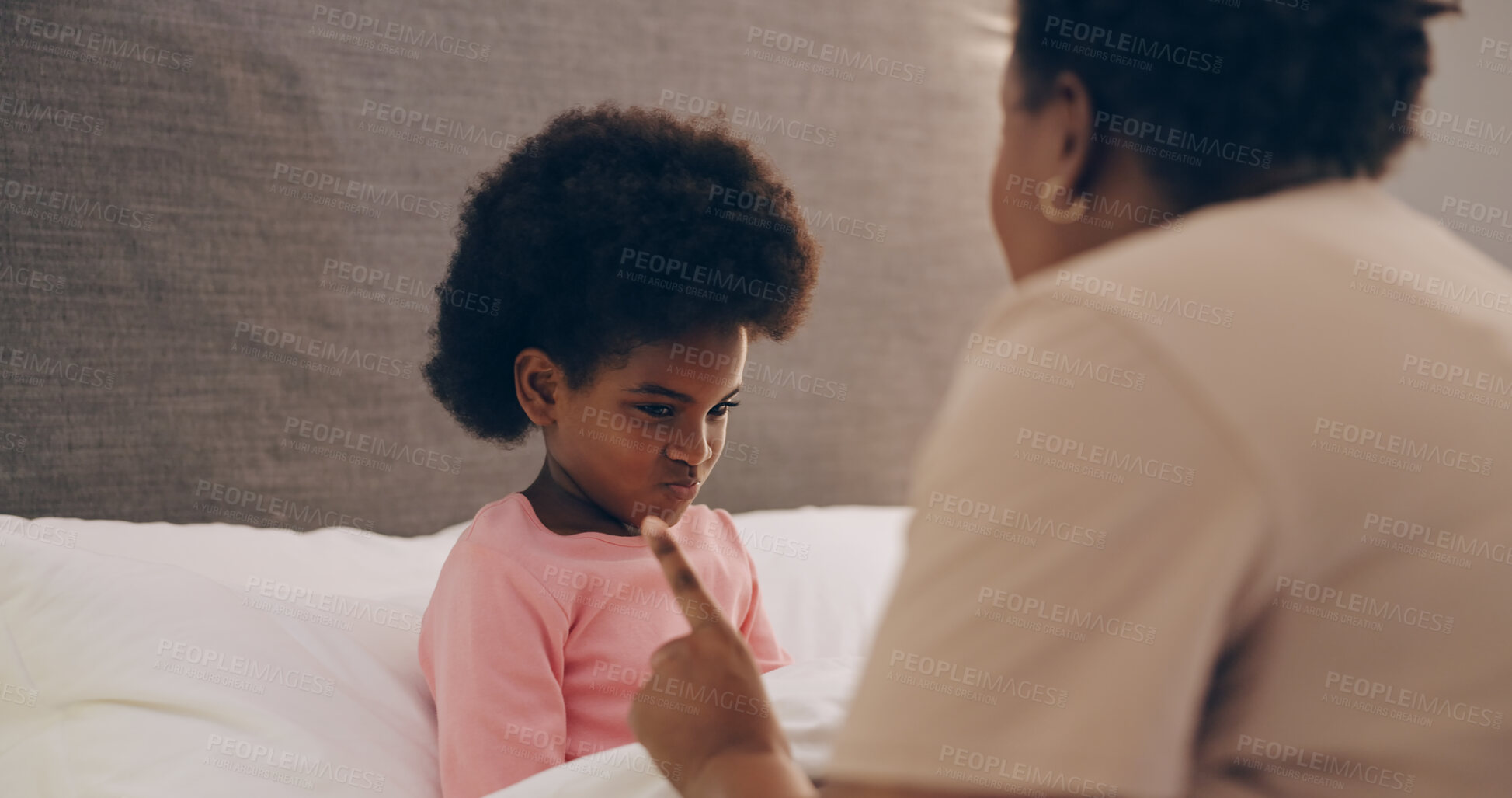 Buy stock photo Mother, discipline and girl child in bedroom with strict parent talking or grounding to stop bad behaviour. Angry, family or frustrated African mom scolding a naughty kid with punishment in home