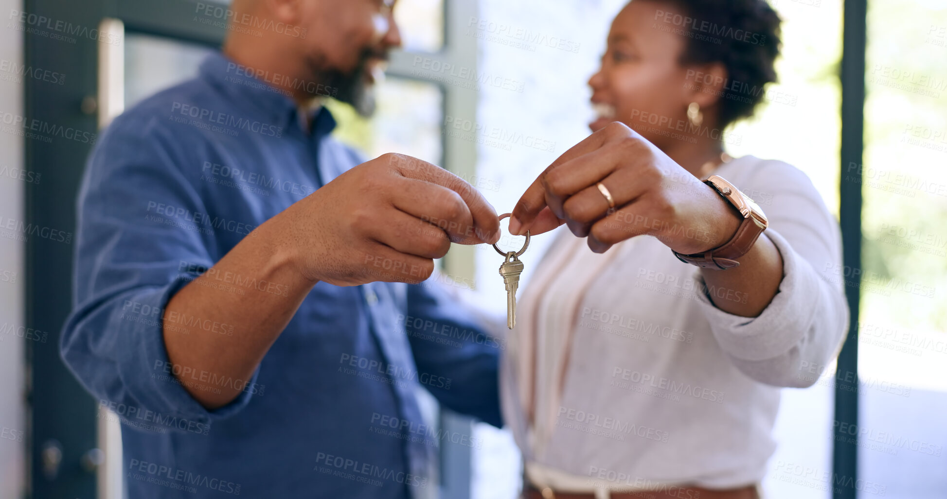 Buy stock photo Hands, moving and holding of key in new home with closeup for real estate, property investment or mortgage. Couple, man or woman for new beginning in marriage with love, care or bond in relationship