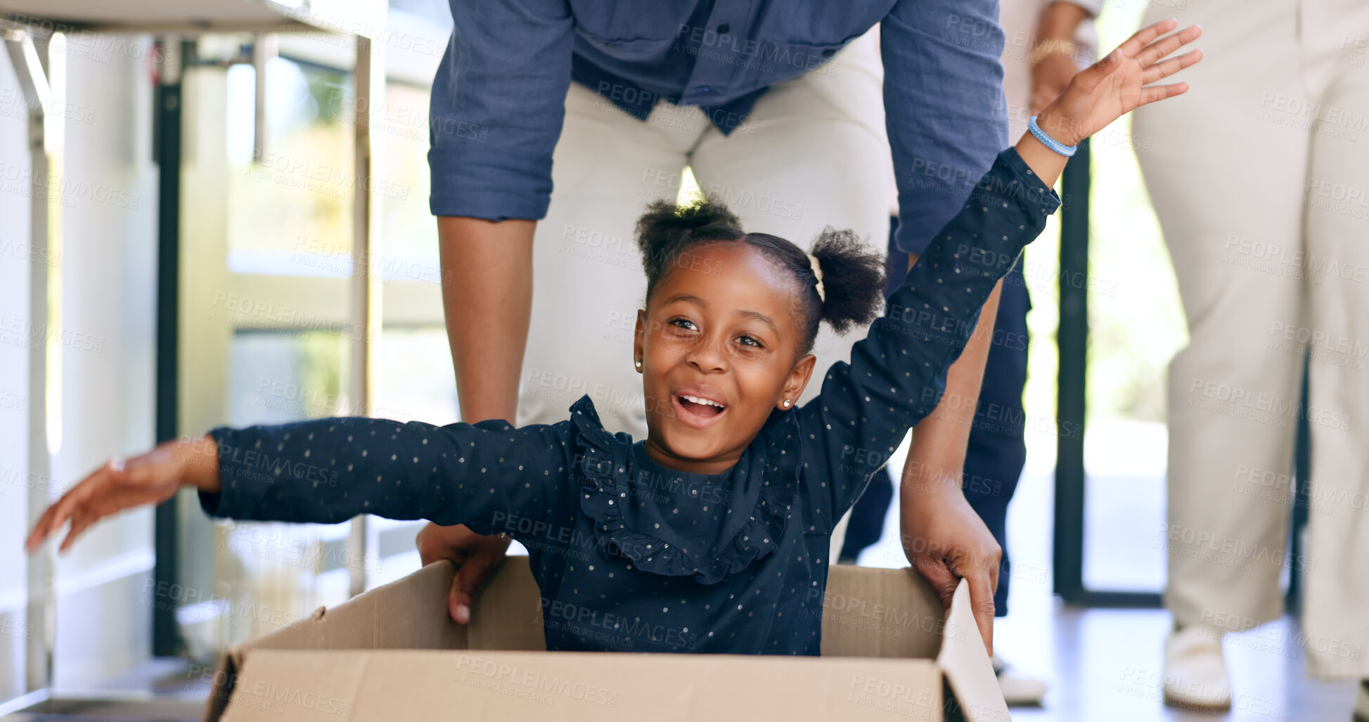 Buy stock photo Playing, black man in new home, child in box and smile at front door with property mortgage. Moving, father and game with daughter in house, excited for investment, real estate and future together.