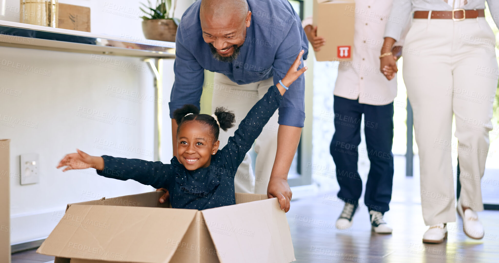 Buy stock photo Black family, new home and push in box, smile and together in apartment or house. Girl, father and kid play in cardboard game, happy and real estate loan, moving and celebrate mortgage in property