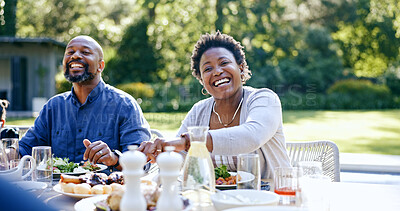 Happy couple, portrait and garden lunch by table for summer vacation, reunion and together with love for care. Black people, man and woman at gratitude brunch with bonding, drinks with cuisine