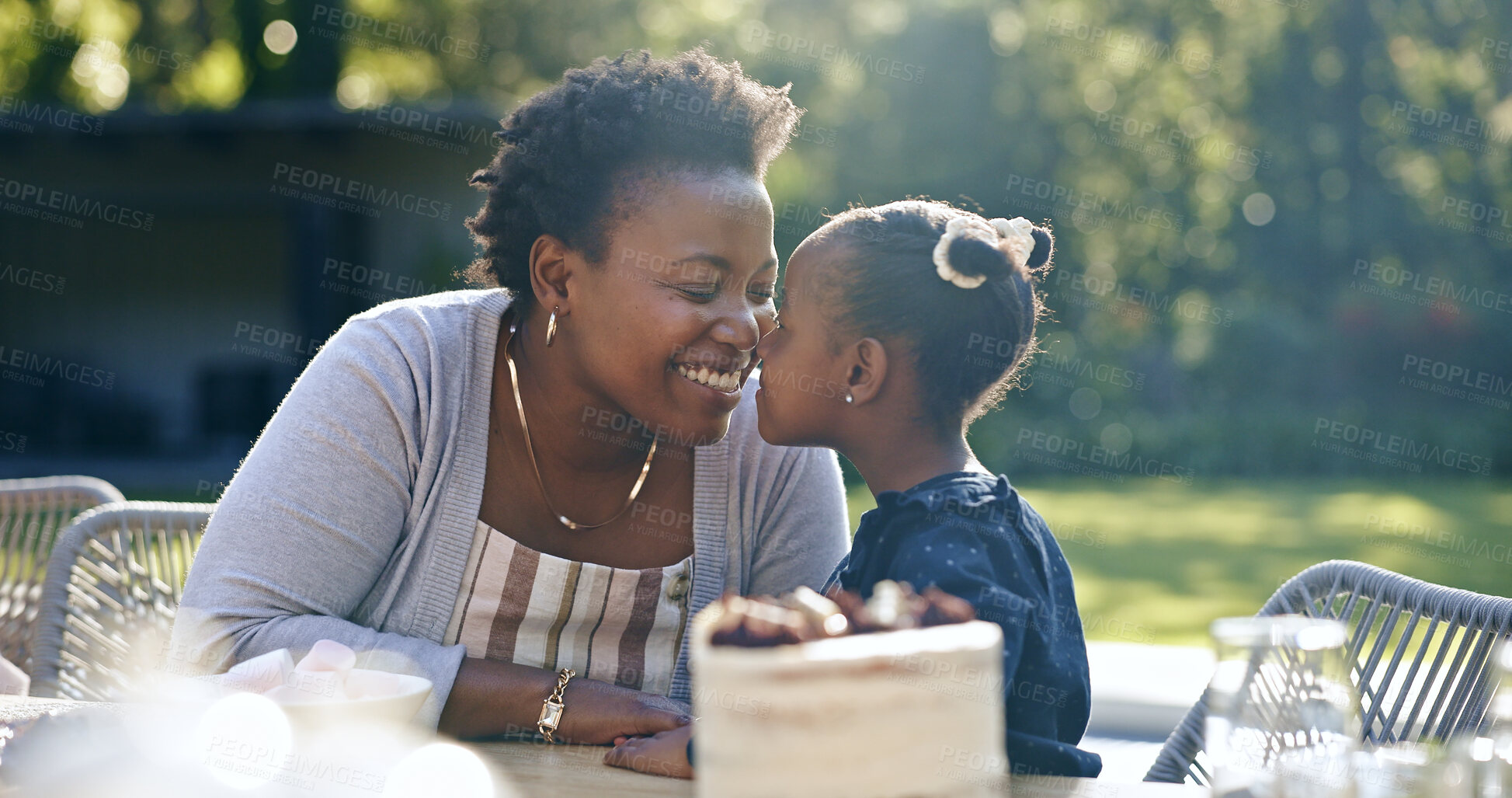 Buy stock photo Mother, daughter and nose touch in nature for birthday, garden party and happy celebration in summer. Black people, woman or child with love bonding in smile, cake or smile together in outdoor park