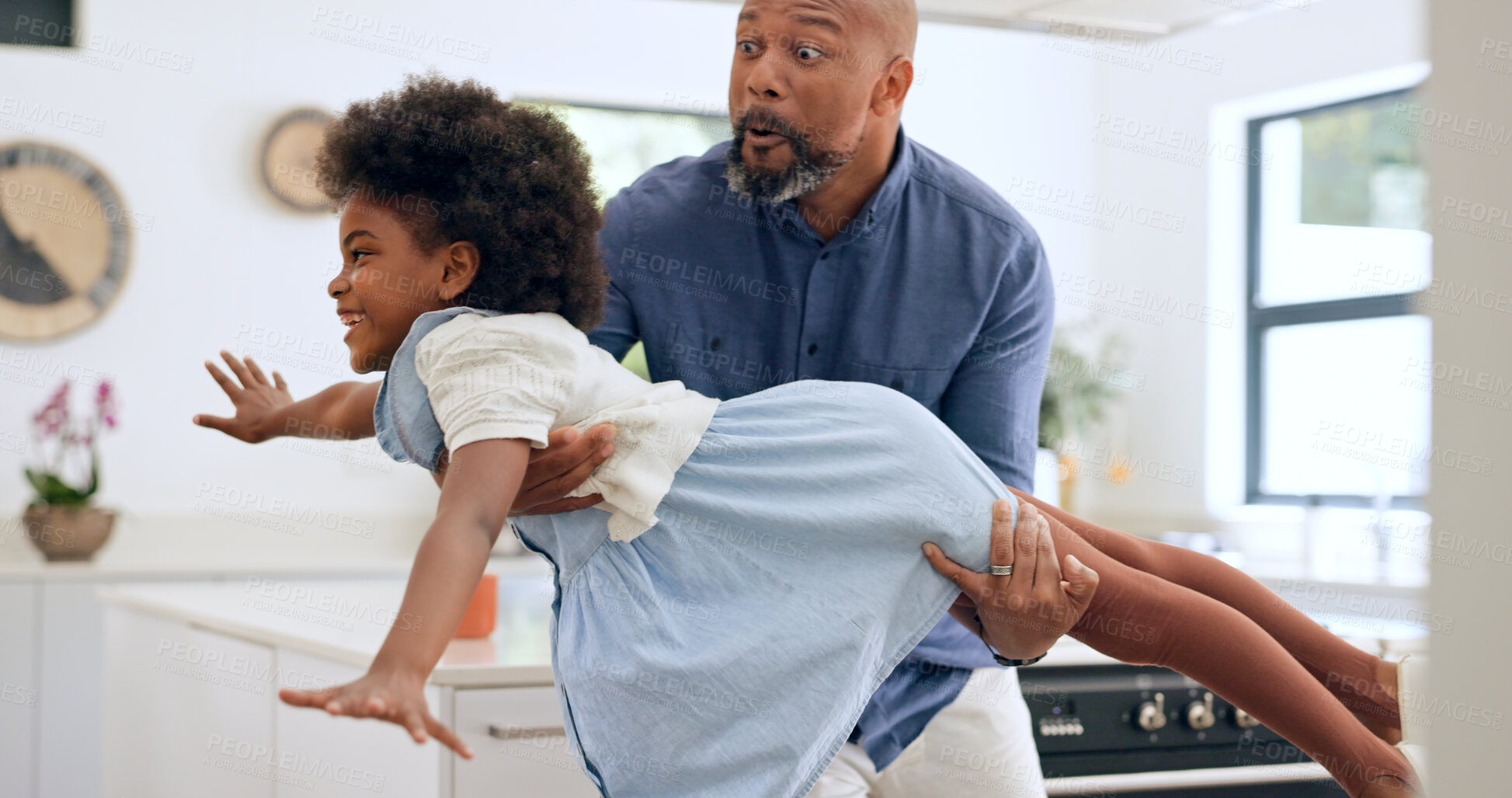 Buy stock photo Child, dad and happy with airplane game in kitchen, freedom and fun with love bonding in home. Black family, playing and fantasy flying with arms in air, young daughter and trust together in house