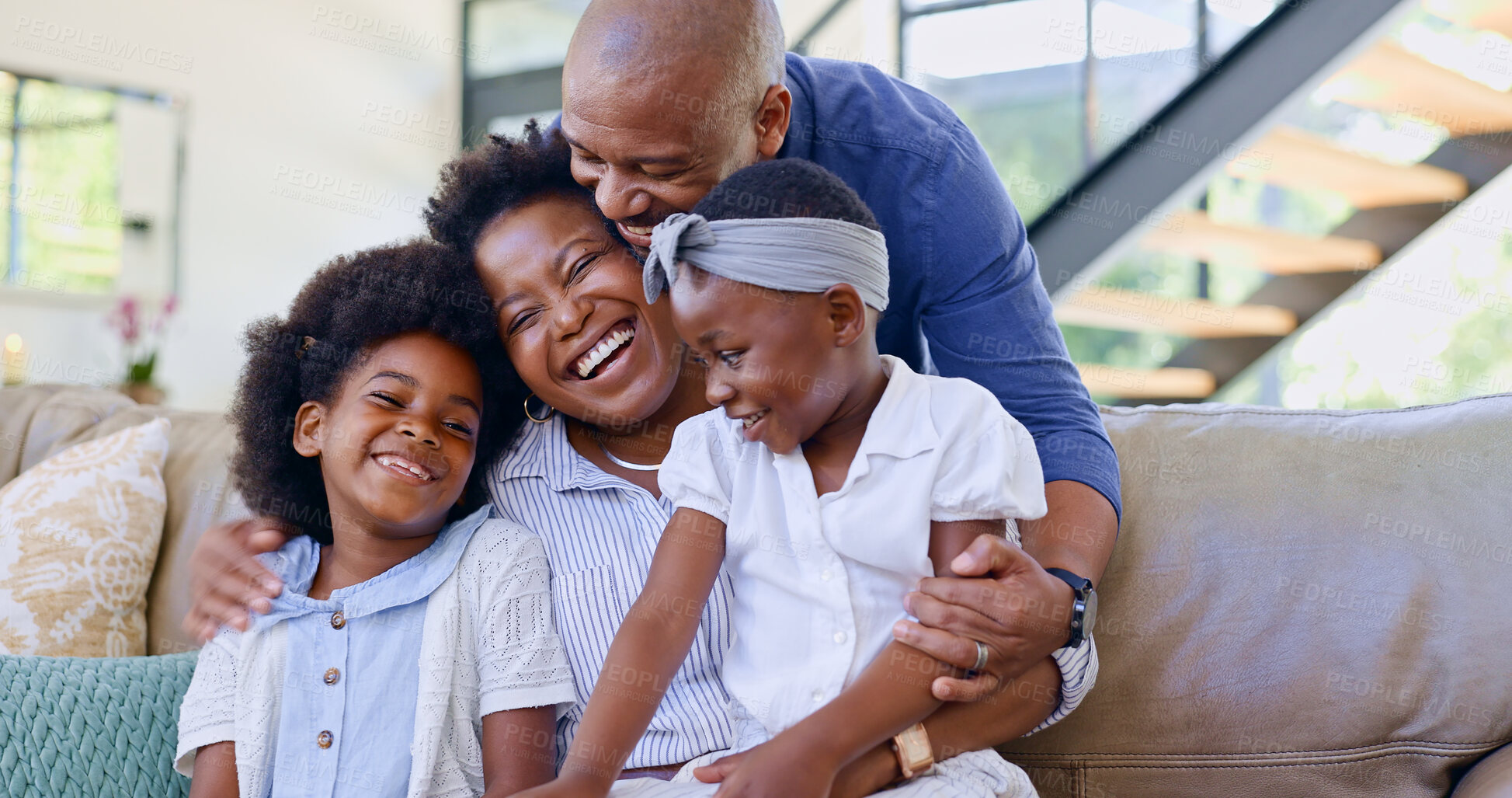 Buy stock photo Happy family, children and hug on sofa in living room for bond, embrace and together. Black man, woman and girl with laugh for funny joke, story or memory with love, care and relationship in home