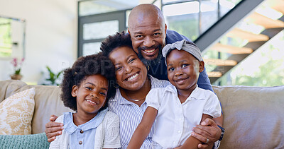 Portrait, happy family and children with hug on sofa in living room for bonding, security and support. Black man, woman and girl with embrace, love and together with care for relationship in home