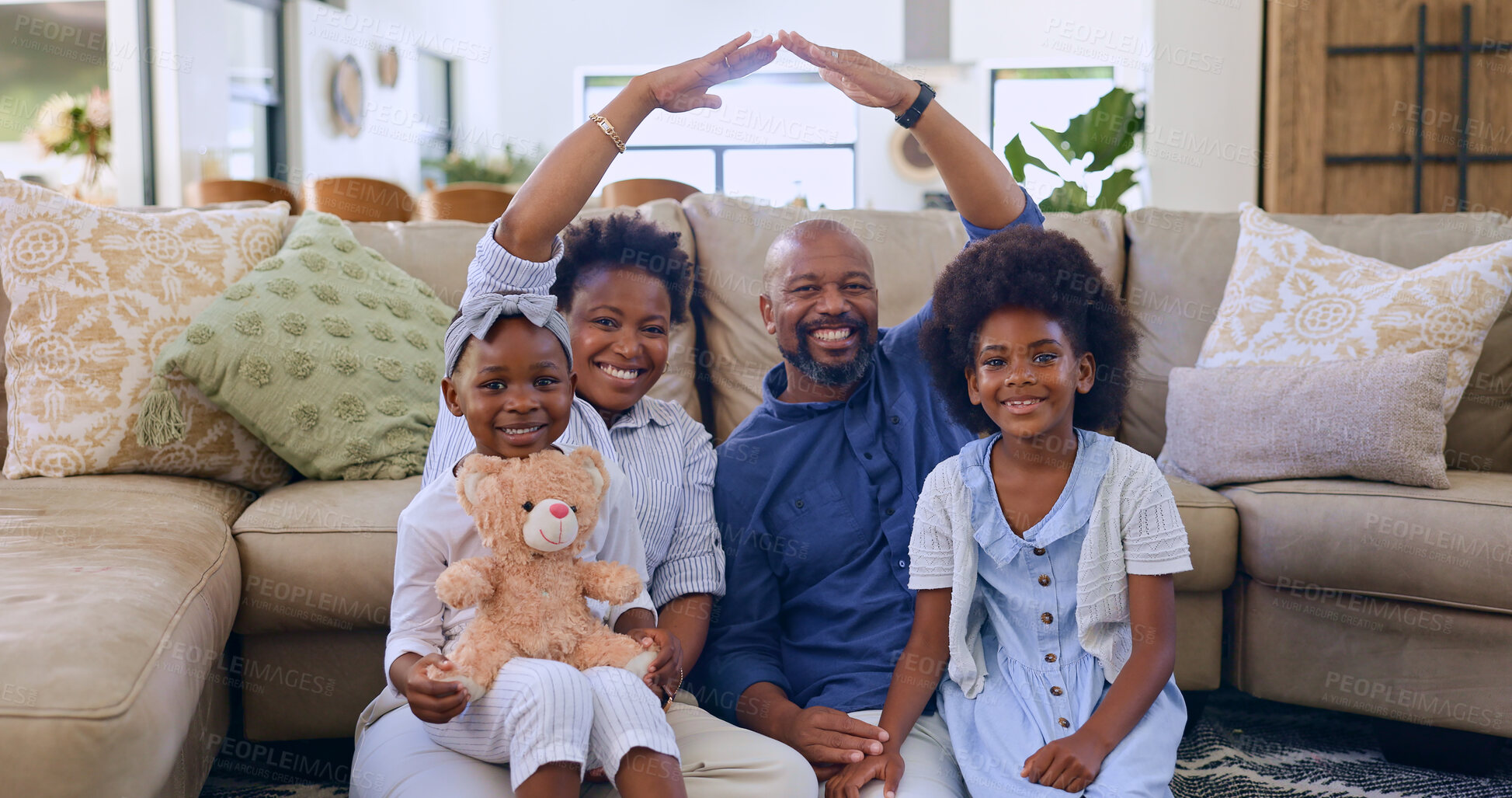 Buy stock photo Black family, roof hands or portrait of happy kids in living room at home for support or insurance. Security, property investment or parents with children siblings for cover, safety or protection