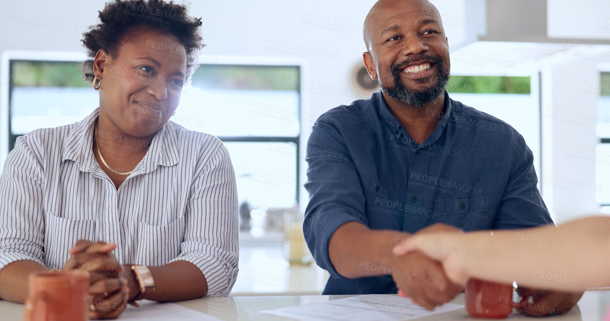 Buy stock photo Meeting, handshake and couple with financial advisor for home purchase deal together. Happy, smile and African man and woman shaking hands with real estate agent for house, apartment or property.