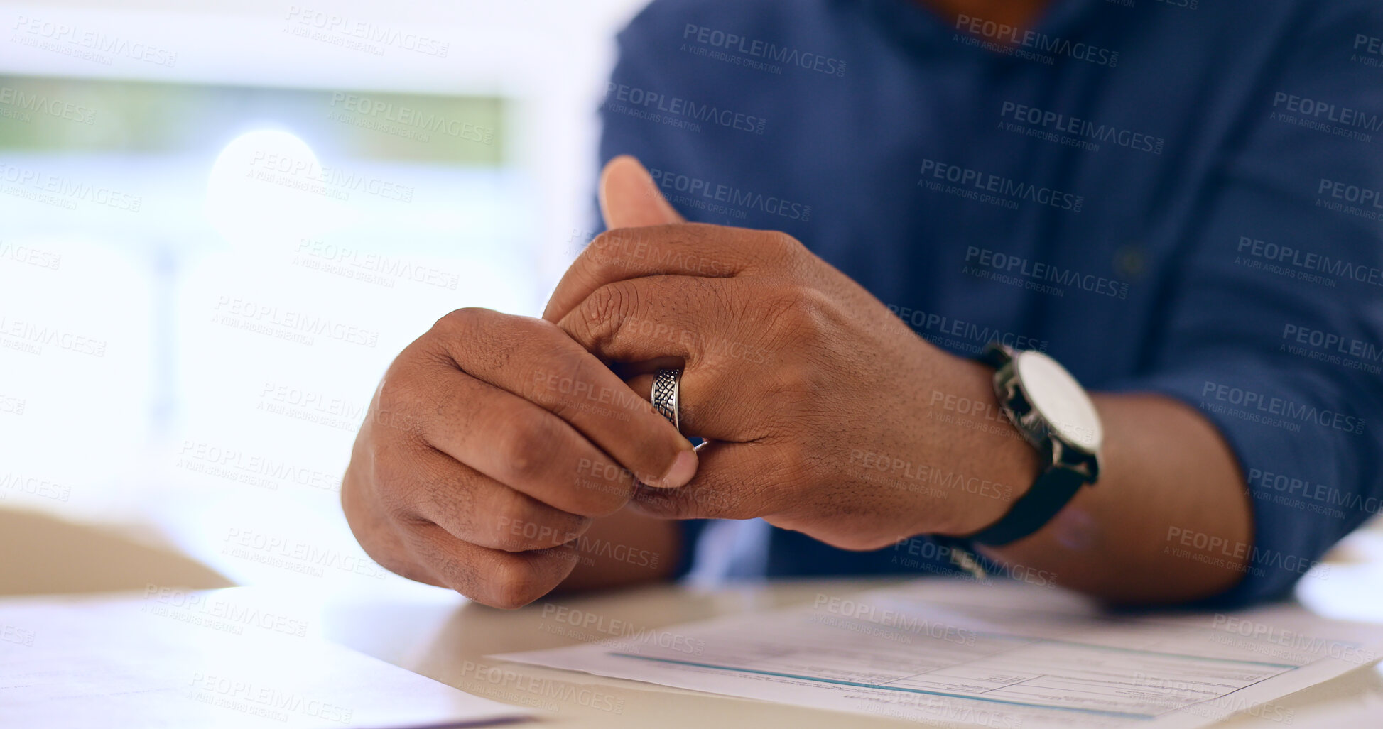 Buy stock photo Hand, wedding ring and divorce with document in home for breakup, fight or conflict in marriage with closeup. Man, engagement band and alone with doubt for affair at home with anger, problem or loss