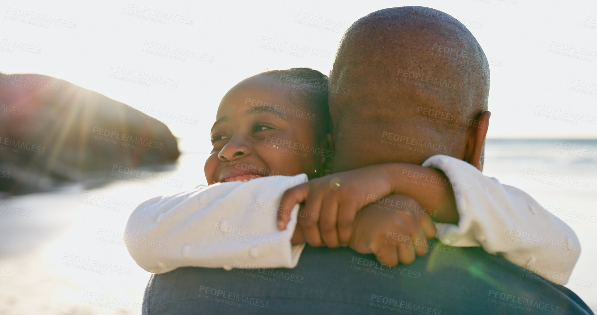 Buy stock photo Man, love and hug child by beach, smile and nature to support relax on calm holiday. Happy family, father and daughter with bonding for care, travel vacation and bali shore for wellness with back

