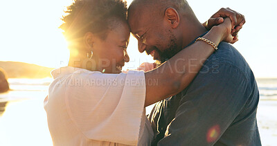 Buy stock photo Couple, hug or smile on beach with love, bonding and sunlight for holiday, vacation or relationship. Black people, man or woman with embrace, happy and romance by ocean or sea for travel or adventure