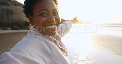 Woman, selfie and beach or pointing at sunrise, relaxing and peace for social media, post and update on holiday. Happy black person, portrait and ocean on vacation, getaway and travel, fun or freedom