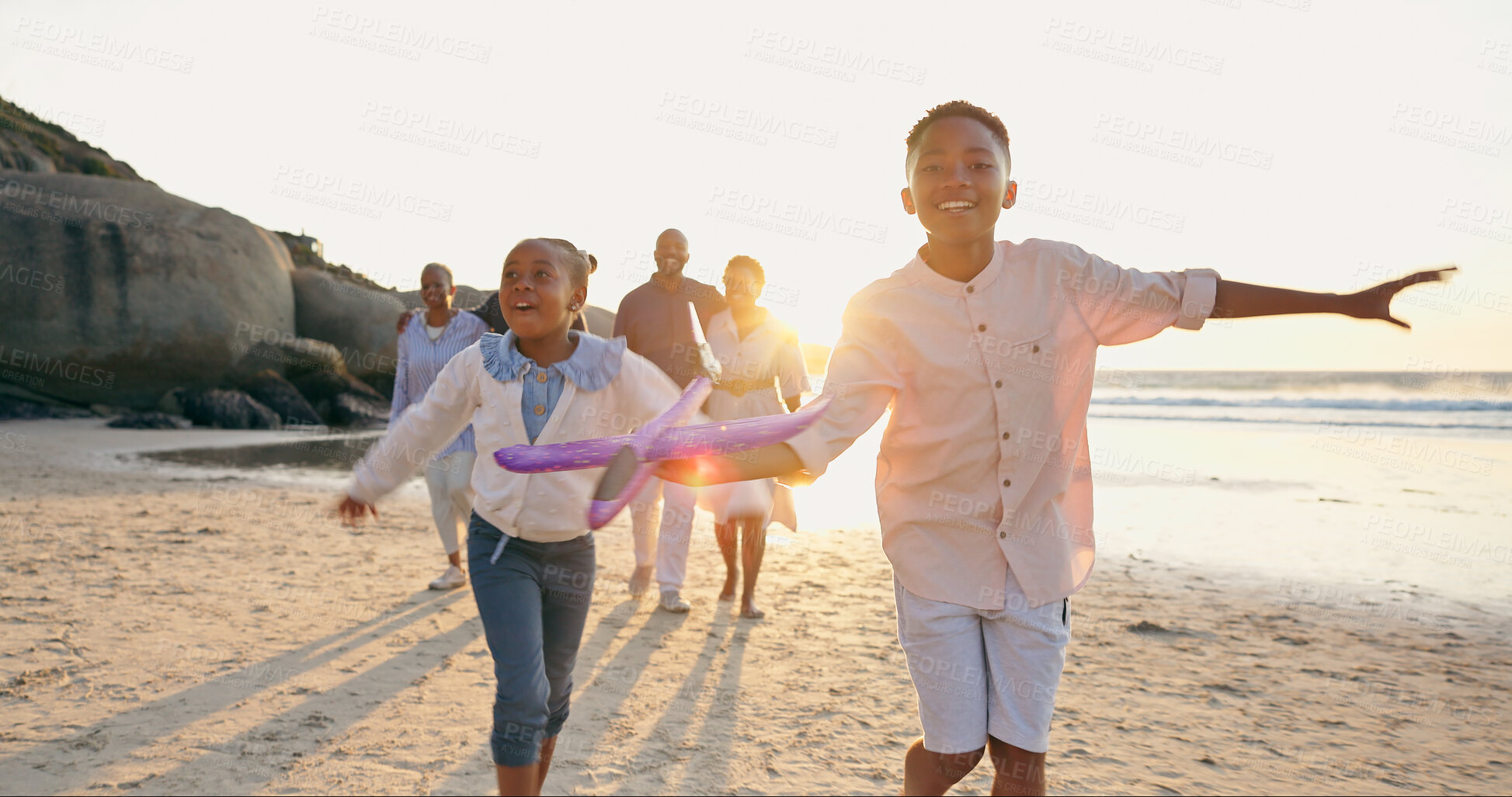 Buy stock photo Children, sand or beach with toy airplane for love, happy  or summer vacation to play wellness. Black family, smile or siblings to fly plane game at sea, travel or cape town freedom by horizon  

