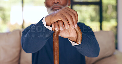 Walking stick, hands and elderly man with disability, stroke rehabilitation or homecare support in retirement. Closeup, senior and wood cane for balance of parkinson, arthritis or help for healthcare