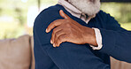 Senior man, hands and shoulder with pain in home from arthritis, osteoporosis and tired joints, muscle and medical emergency. Closeup, elderly and help for arm injury, fibromyalgia or healthcare risk