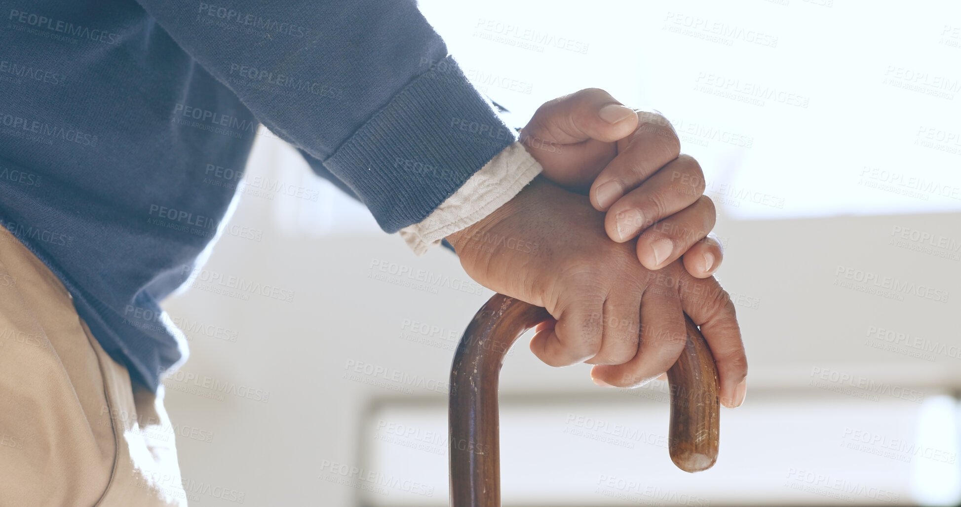 Buy stock photo Cane, hands and senior man in home living room for retirement in house. Walking stick, closeup and elderly person with a disability, crutch for injury and support, help for health and osteoporosis